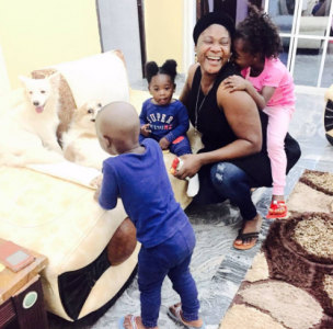 Mercy Johnson Shares Beautiful Photo Of Herself With Her Kids And The Family's Dogs